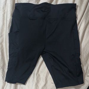 black plus size athletic biker shorts with pockets